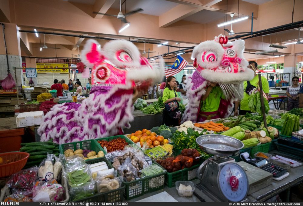 One of the fun events of Chinese New Year are the Lion Dances that happen all over the city. A troop of dancers and musicians dance to give a prosperity blessing to a shopkeeper in return for Aung Pow or a offering or gift.