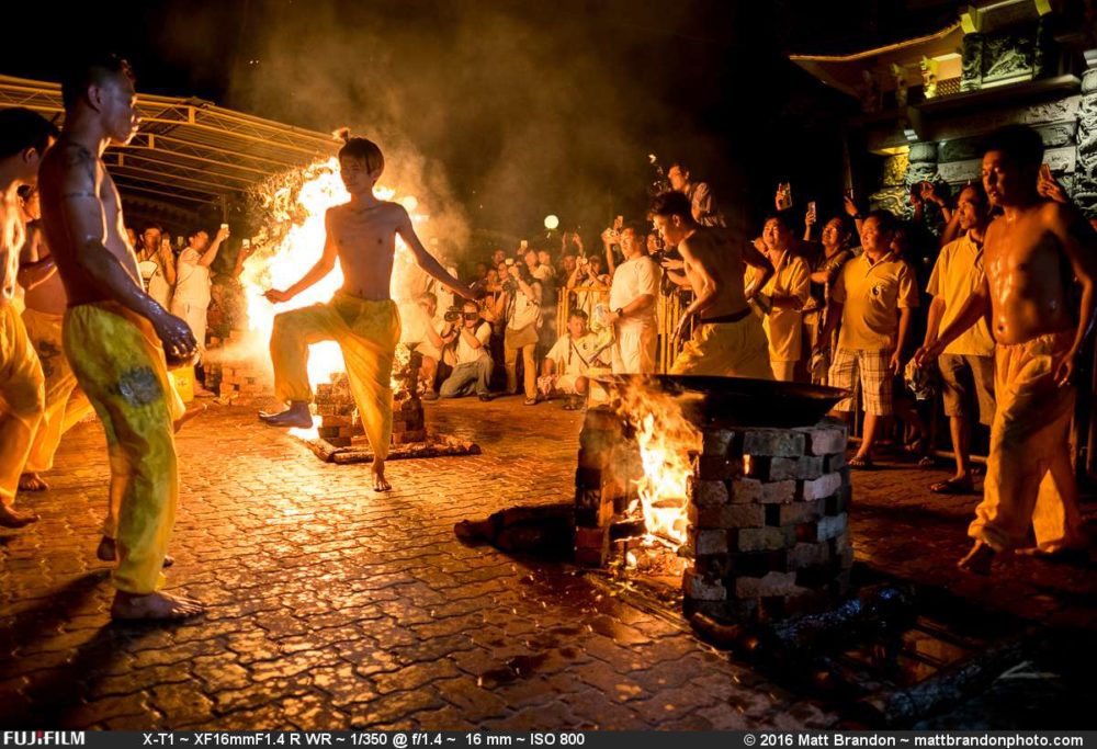 Possessed by spirits of children, the mediums dance around the fire playfully.